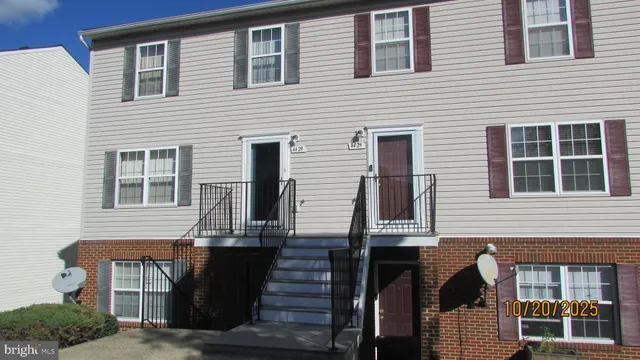 a front view of a house with a balcony