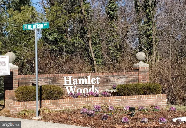 a front view of a building with street view