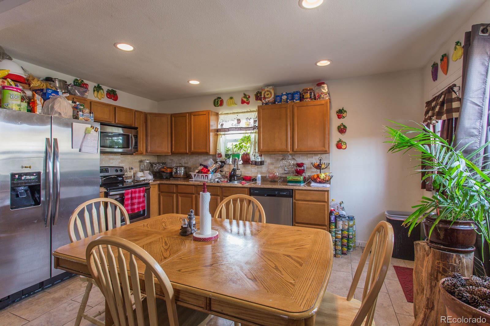 1911 Chambers Road Aurora, CO 80011 - Photo 8 of 20 Gallery Image 8