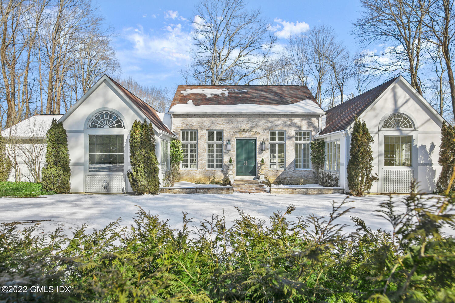 32 Peaceable Street Ridgefield, CT 06877 - Photo 1 of 38 a view of house with yard and sitting area