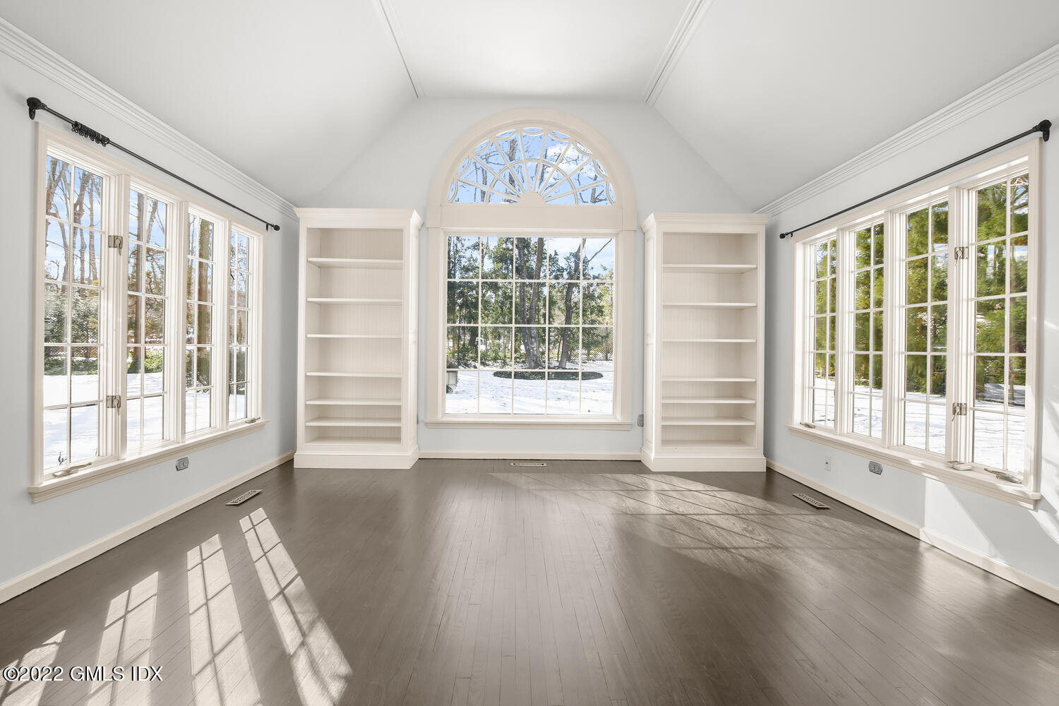 32 Peaceable Street Ridgefield, CT 06877 - Photo 12 of 38 a view of an empty room with wooden floor and a window