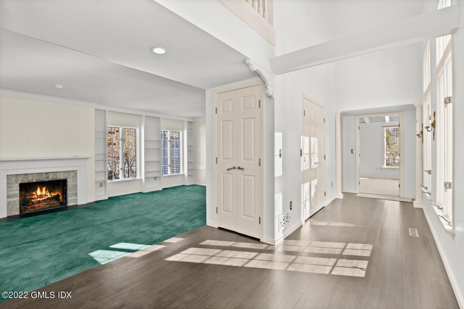32 Peaceable Street Ridgefield, CT 06877 - Photo 19 of 38 a view of a livingroom with a fireplace