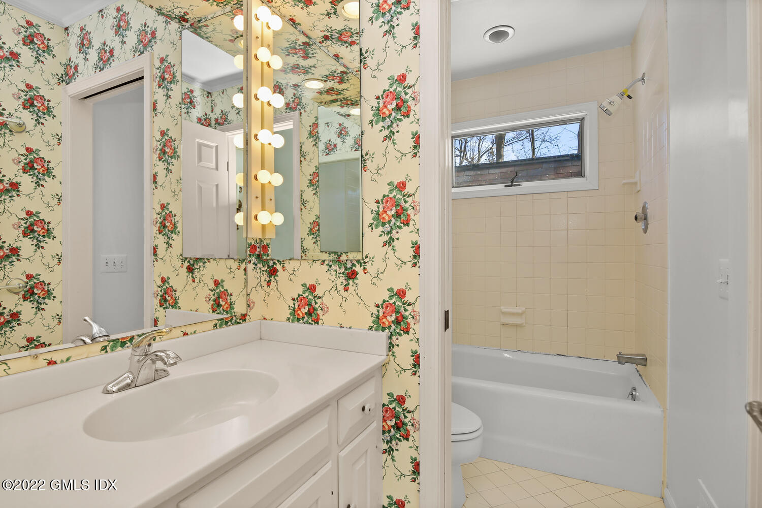 32 Peaceable Street Ridgefield, CT 06877 - Photo 29 of 38 a bathroom with a granite countertop sink a toilet and bathtub