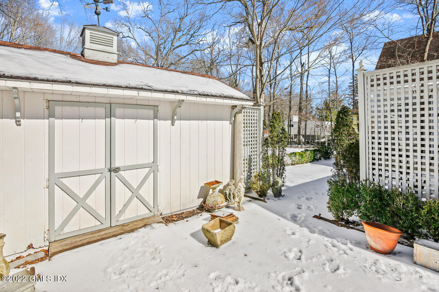32 Peaceable Street Ridgefield, CT 06877 - Photo 33 of 38 a view of a two chair in the patio