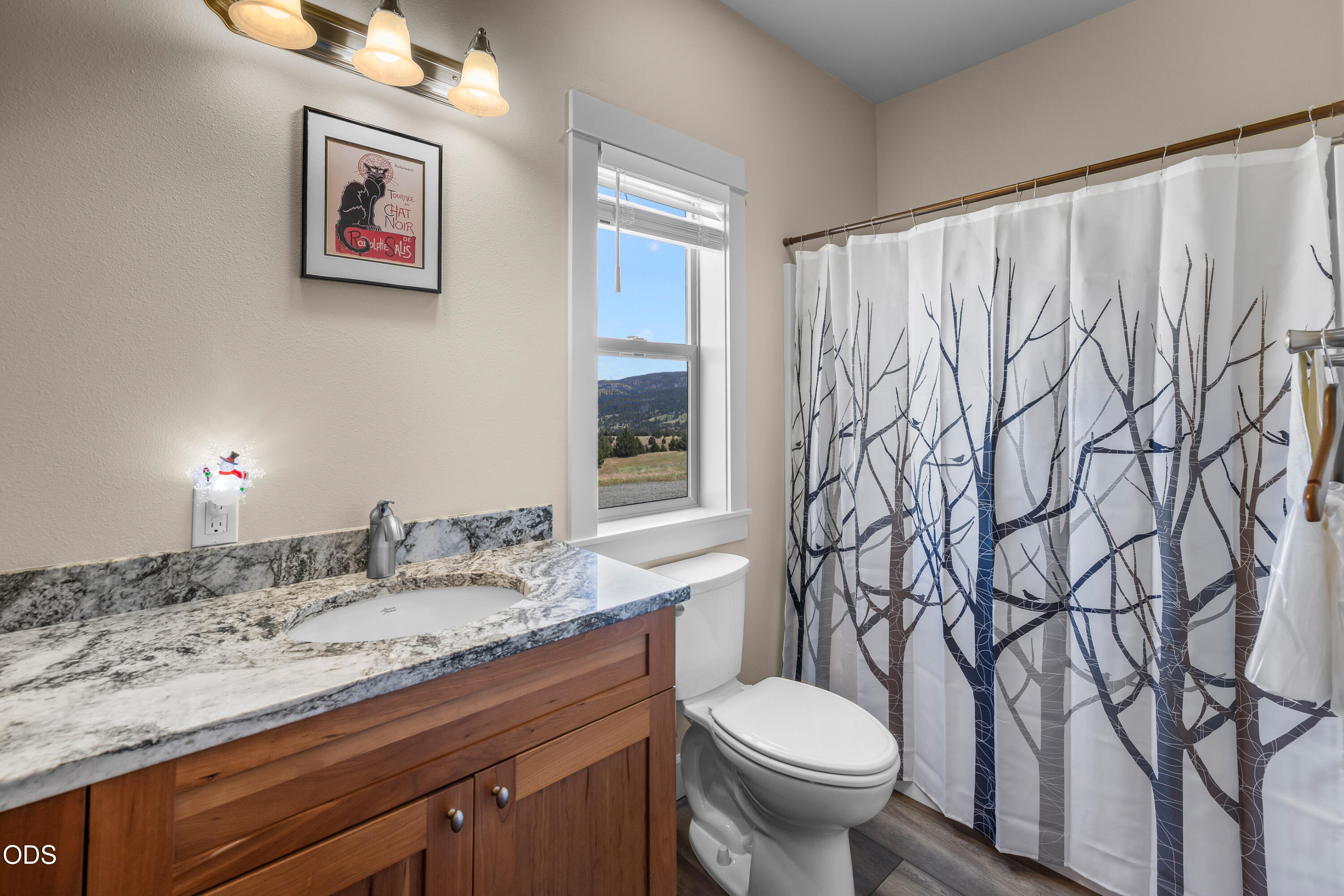 26216 West Bench Road John Day, OR 97845 - Photo 28 of 53 a bathroom with a granite countertop sink and a toilet