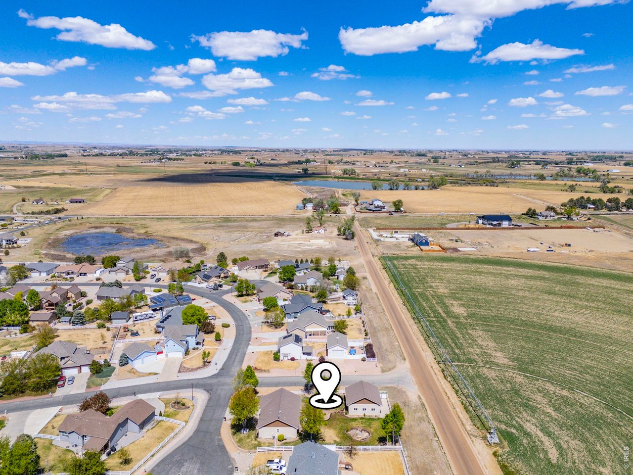 2002 Trail Ridge Drive Severance, CO 80615 - Photo 48 of 50 Situated on a private corner lot in a quiet cul-de-sac, this property backs to farm ground offering a peaceful, tucked-away feeling while still being conveniently close to town and ample amenities.