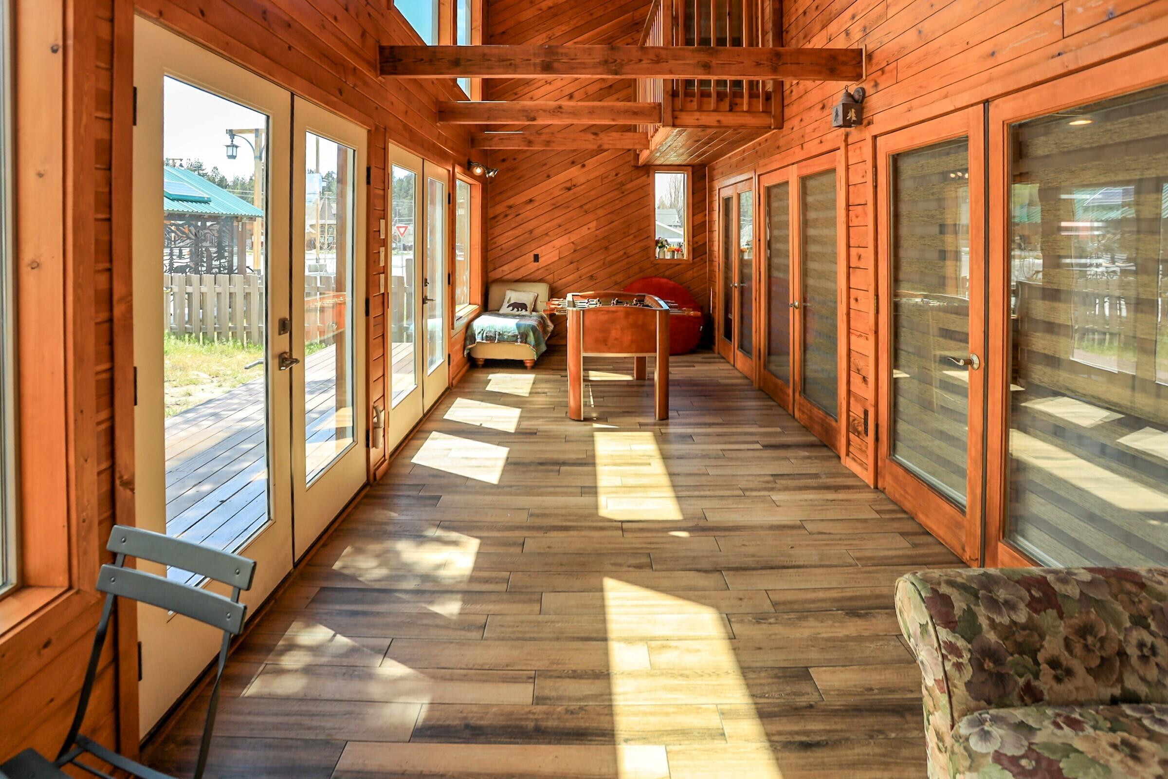 42638 Moonridge Road Big Bear Lake, CA 92315 - Photo 15 of 39 a view of a balcony with wooden floor