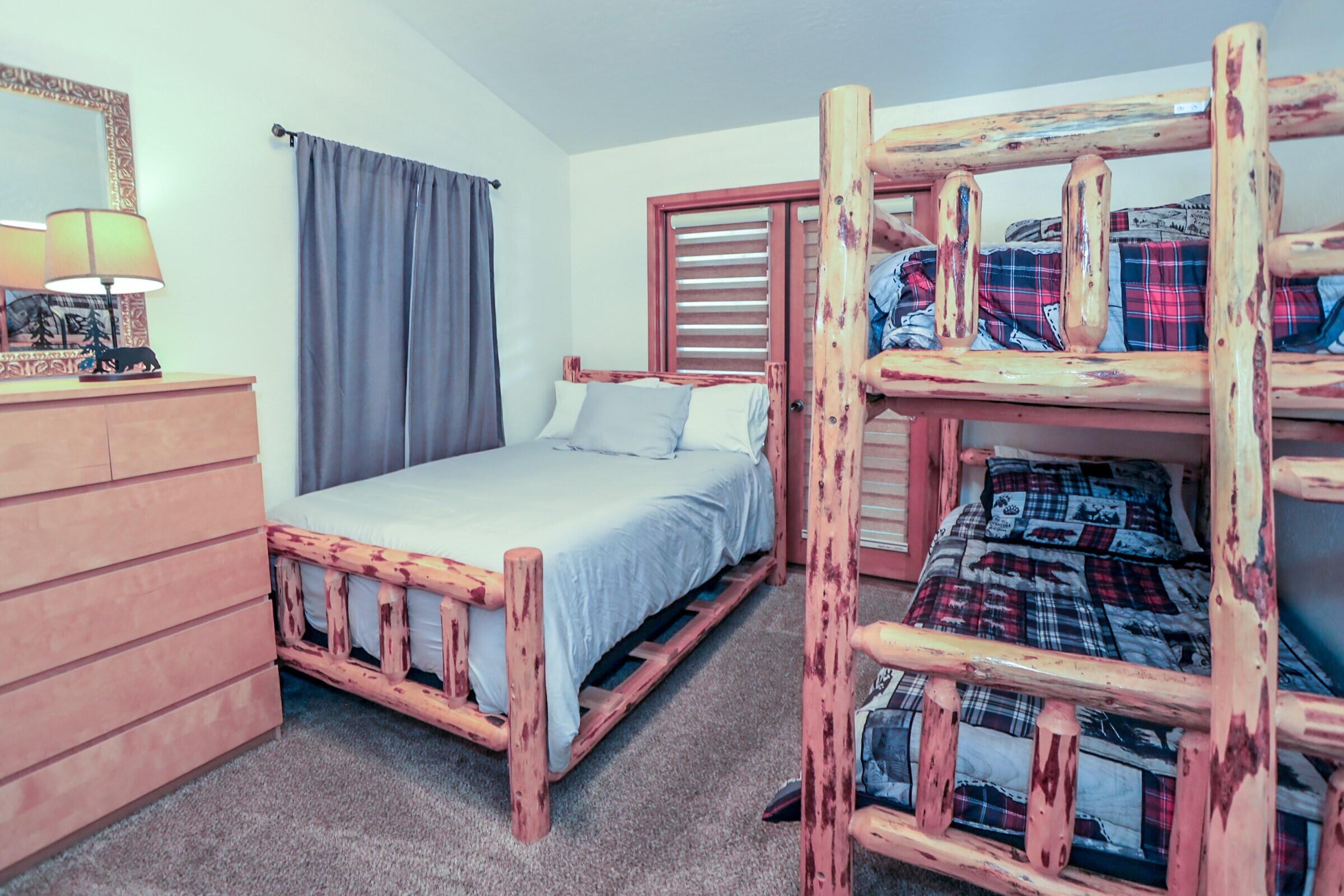 42638 Moonridge Road Big Bear Lake, CA 92315 - Photo 19 of 39 a bedroom with a bed and a dresser