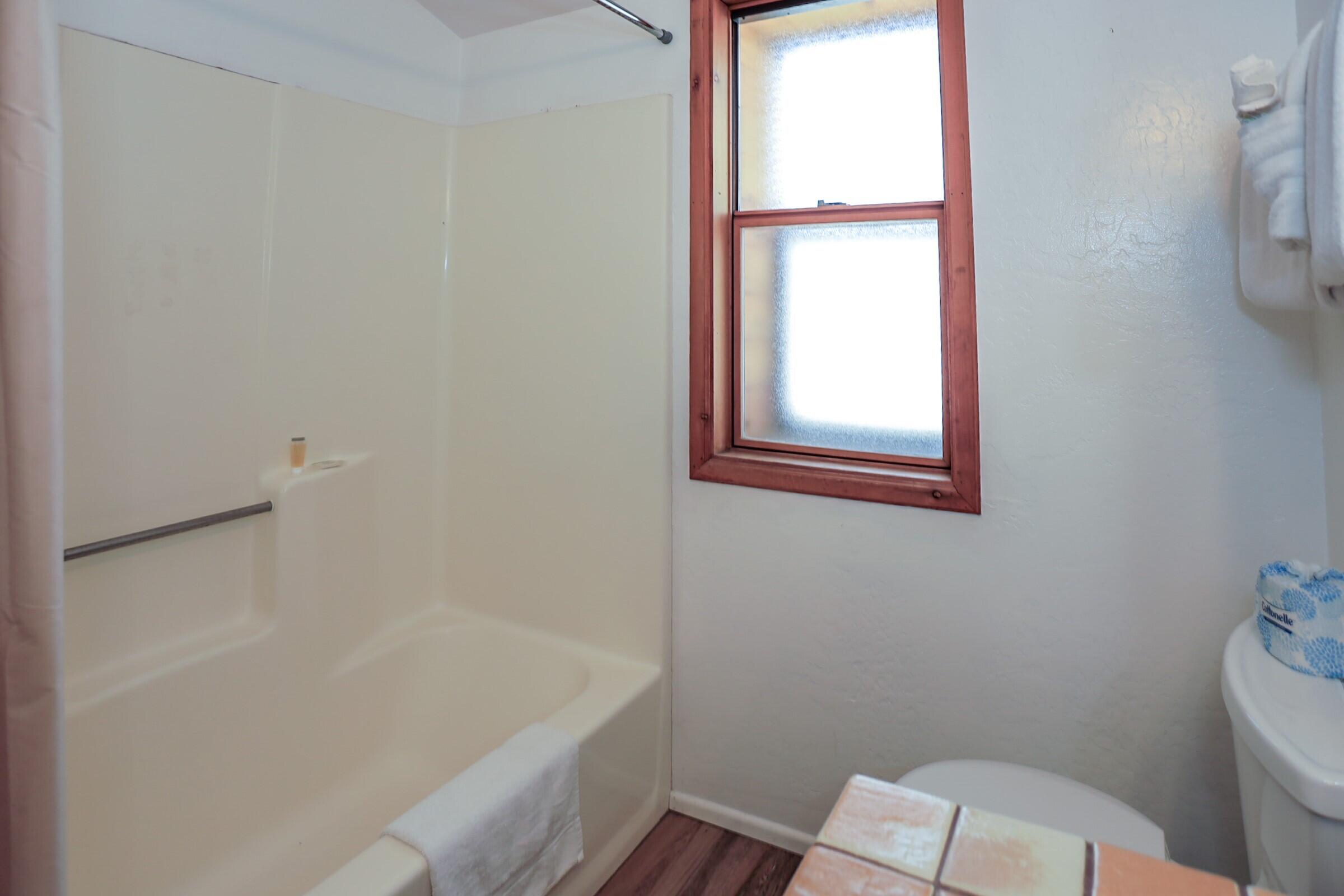 42638 Moonridge Road Big Bear Lake, CA 92315 - Photo 23 of 39 a bathroom with a toilet a sink and a bathtub