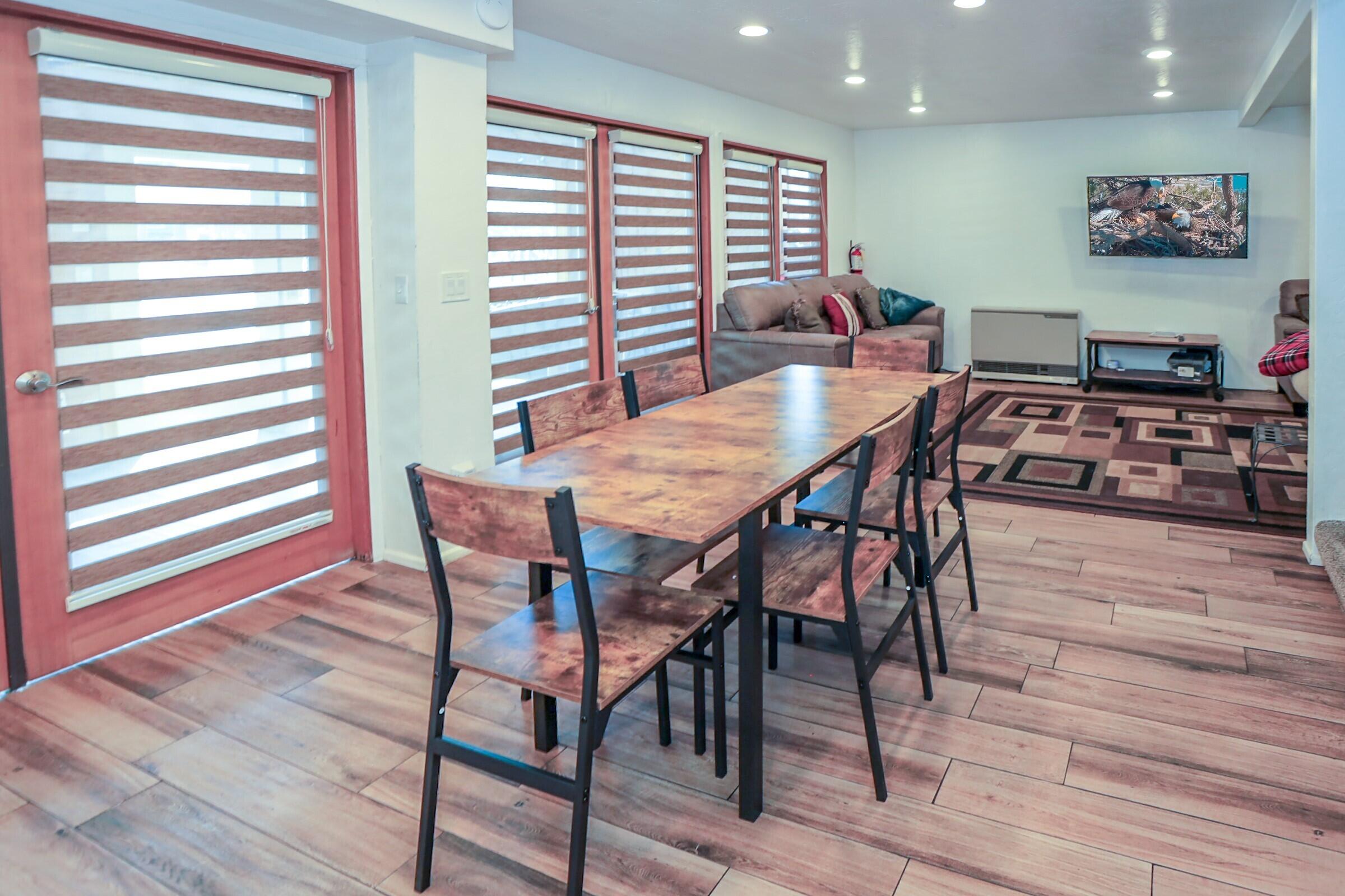 42638 Moonridge Road Big Bear Lake, CA 92315 - Photo 10 of 39 a view of a dining room with furniture and wooden floor