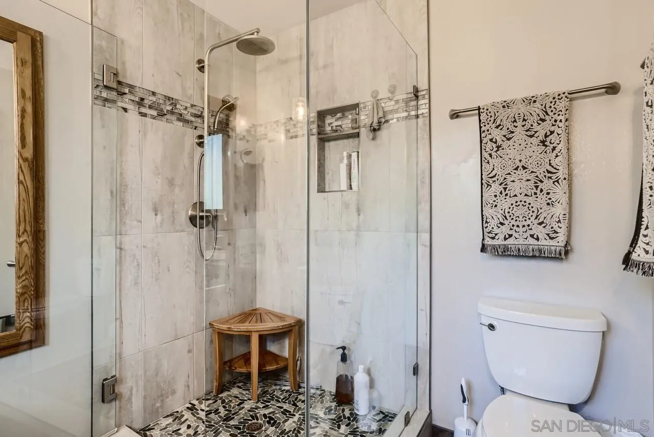 14461 Lyons Valley Road Jamul, CA 91935 - Photo 16 of 27 a bathroom with a toilet and a shower
