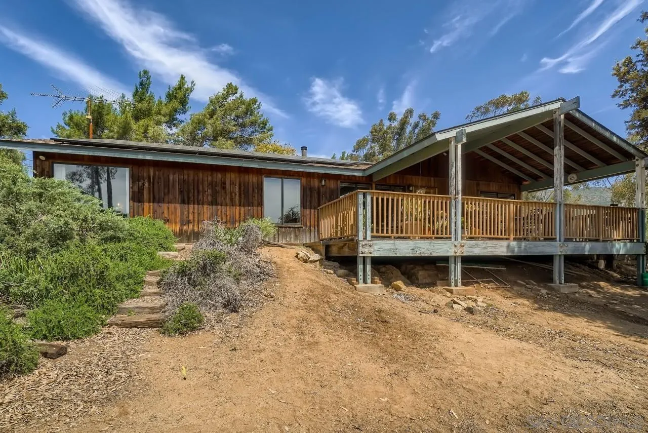 14461 Lyons Valley Road Jamul, CA 91935 - Photo 26 of 27 a view of a house with a window and wooden fence