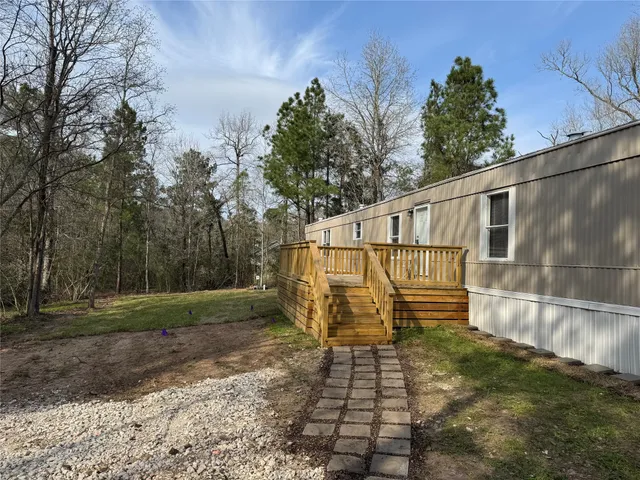 a kitchen with a stove a sink and a refrigerator