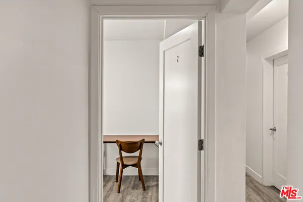 a room with a bed and a window