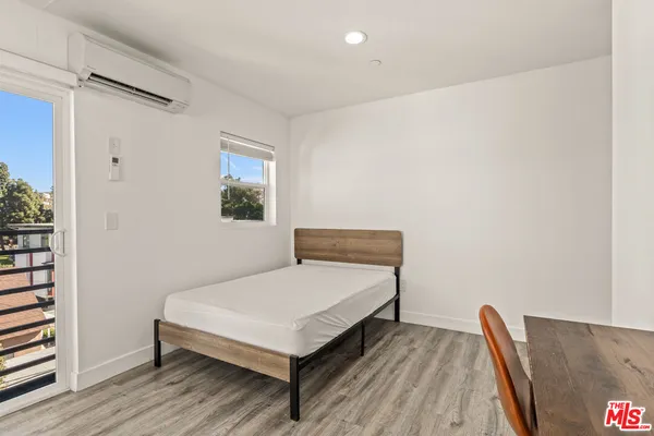 a bathroom with a sink and shower