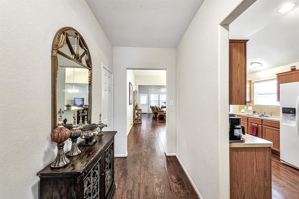 3203 Dale Ridge Trail Houston, TX 77084 - Photo 6 of 33 Foyer view looking inward, highlighting the open-concept transition into the home.