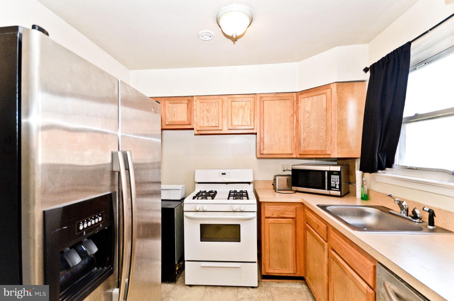 1975 Addison Road South District Heights, MD 20747 - Photo 14 of 24 Kitchen
