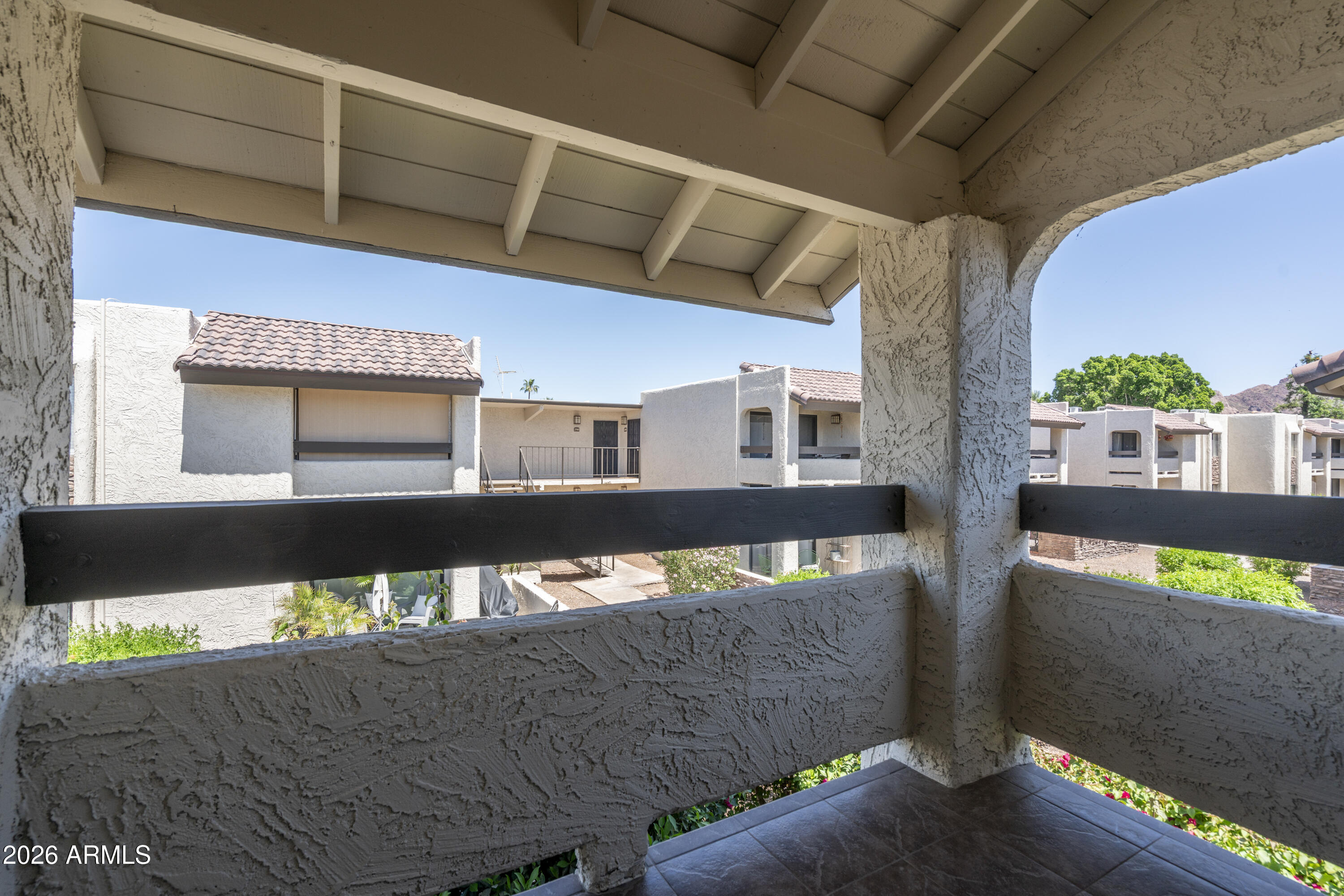 3825 East Camelback Road, Unit 269 Phoenix, AZ 85018 - Photo 14 of 25 a view of a building from a window
