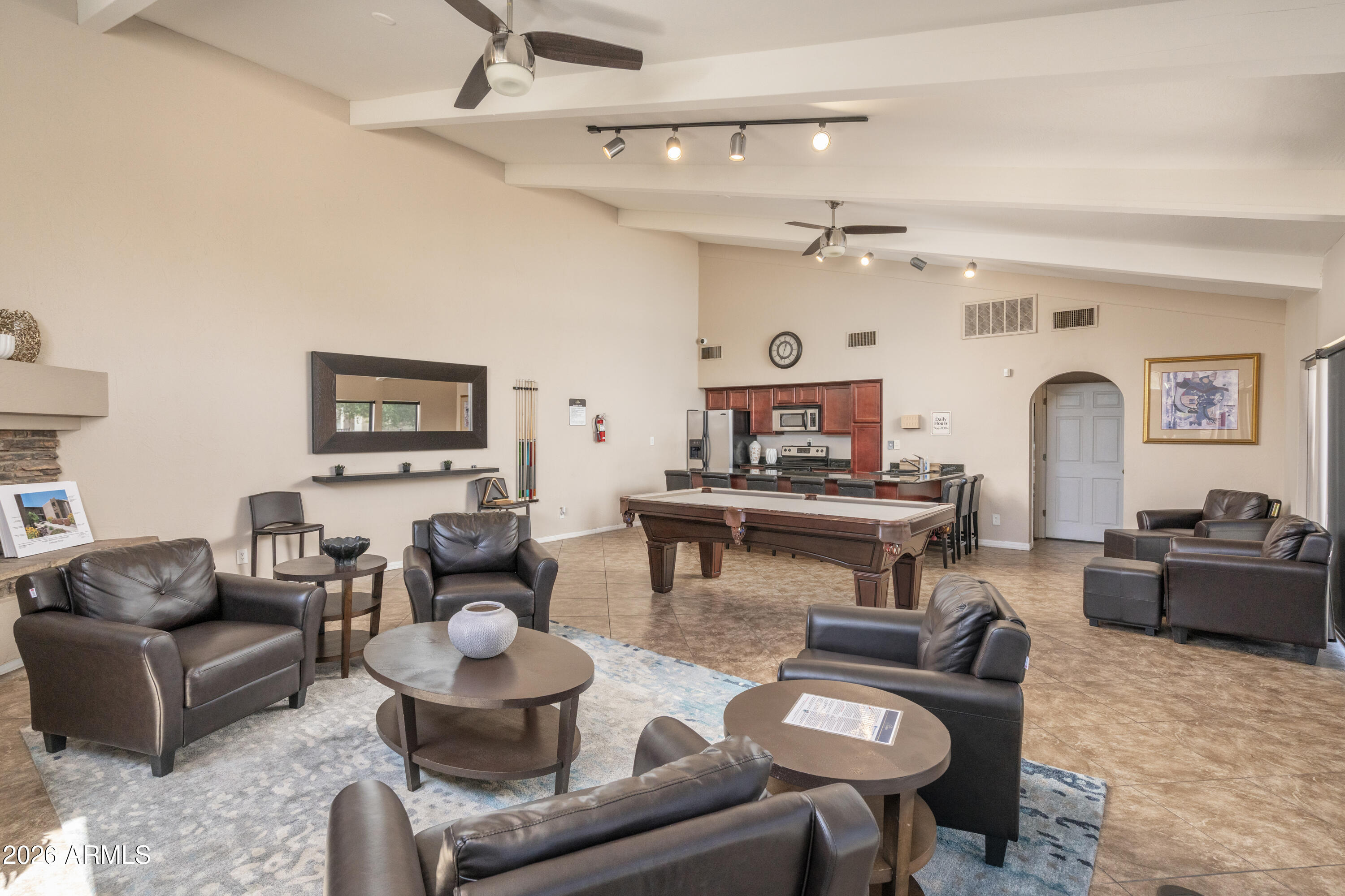 3825 East Camelback Road, Unit 269 Phoenix, AZ 85018 - Photo 18 of 25 a living room with furniture and wooden floor