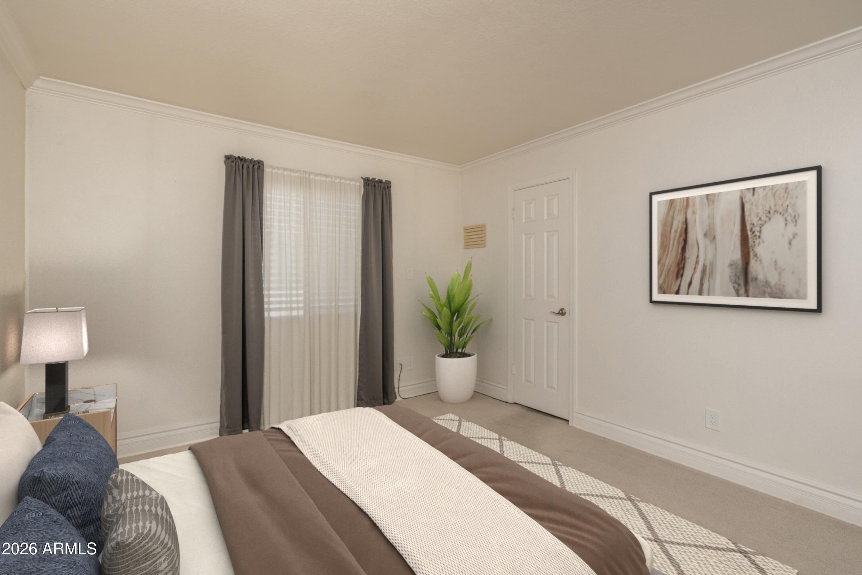 3825 East Camelback Road, Unit 269 Phoenix, AZ 85018 - Photo 10 of 25 a bedroom with a bed and a painting on the wall