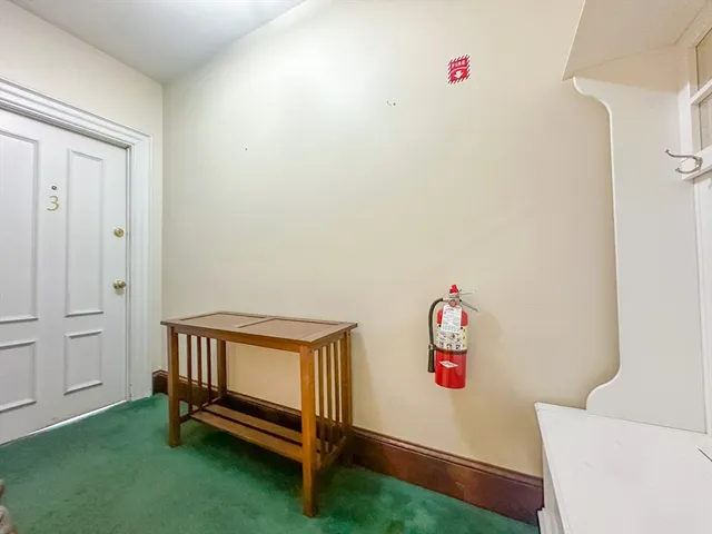 a room with toys and a shelf