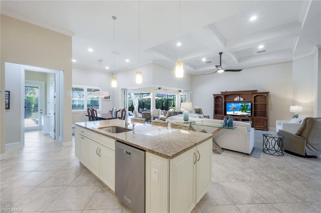 9282 Quarry Drive Naples, FL 34120 - Photo 13 of 50 a kitchen with living room and living room