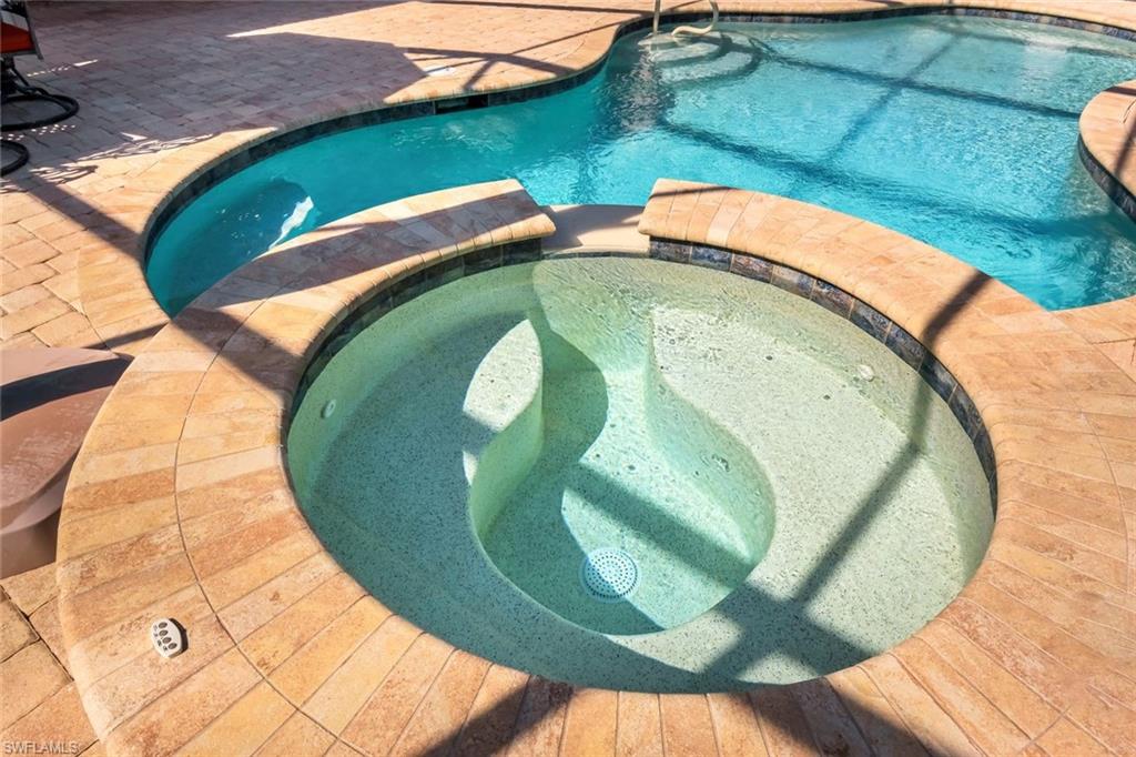 9282 Quarry Drive Naples, FL 34120 - Photo 33 of 50 an aerial view of a swimming pool
