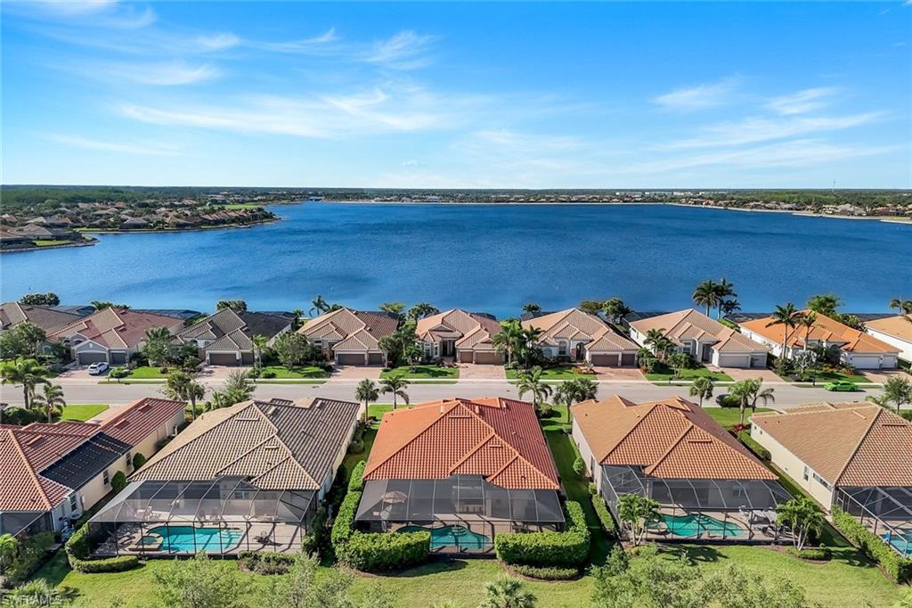 9282 Quarry Drive Naples, FL 34120 - Photo 4 of 50 an aerial view of multiple house