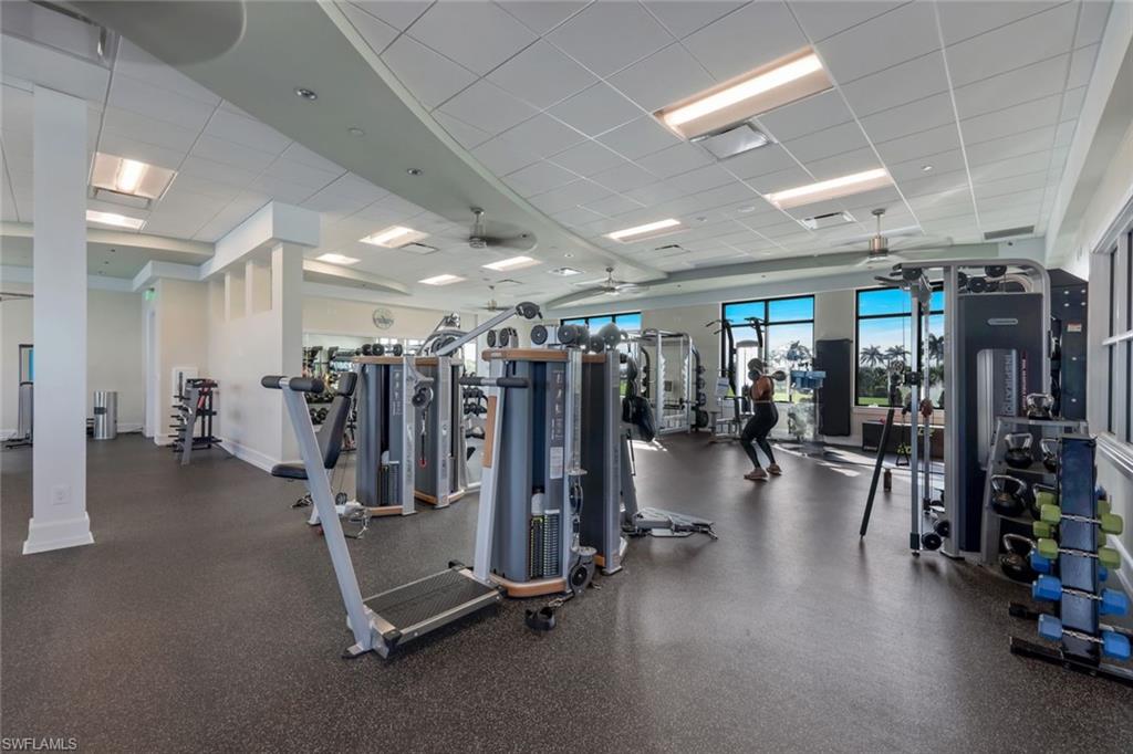 9282 Quarry Drive Naples, FL 34120 - Photo 50 of 50 a view of a room with gym equipment