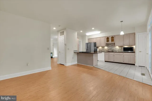 a view of a kitchen with a sink