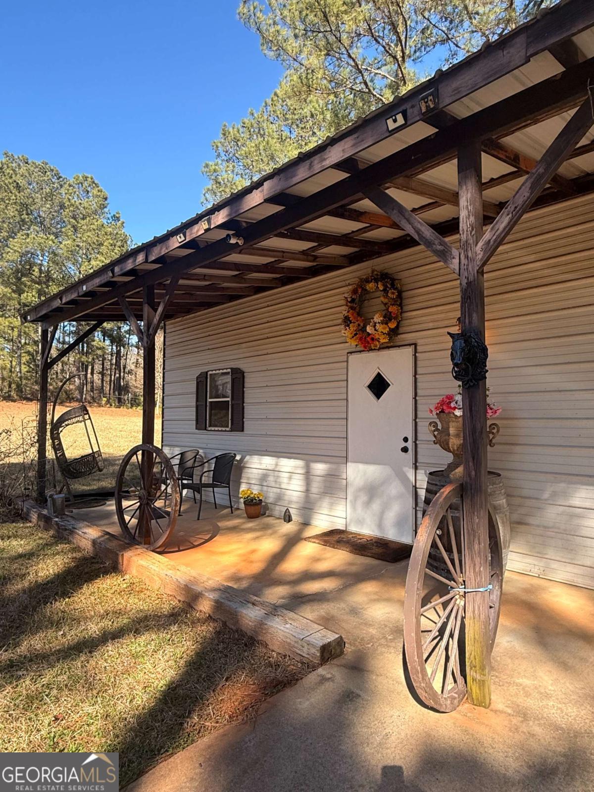670 Jefferies Road Shady Dale, GA 31085 - Photo 12 of 29 a sink with yard and patio