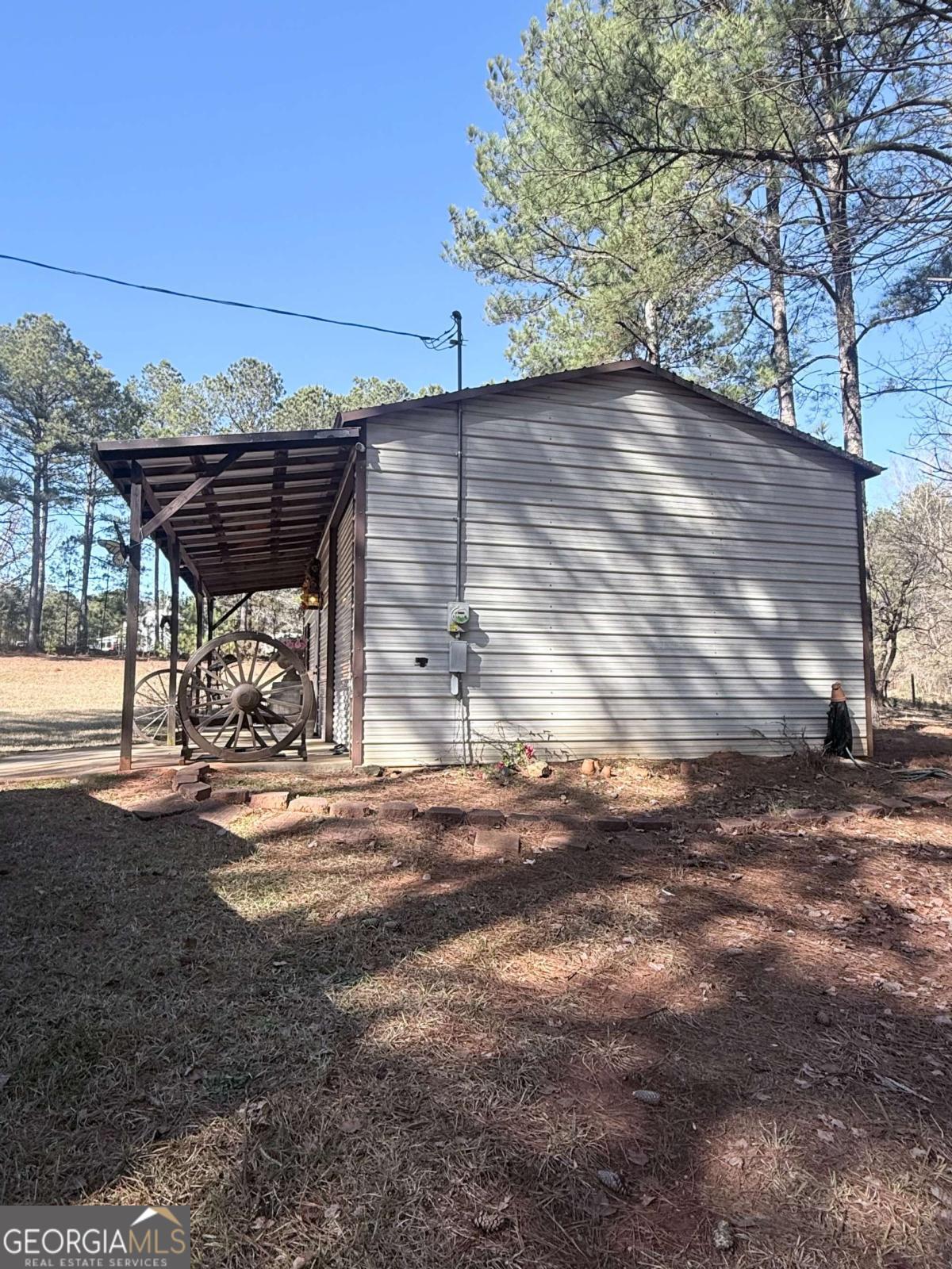 670 Jefferies Road Shady Dale, GA 31085 - Photo 14 of 29 a view of a street with a street