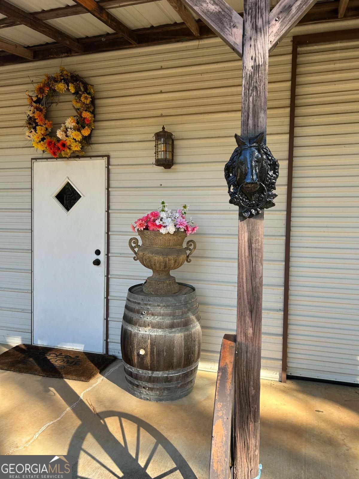 670 Jefferies Road Shady Dale, GA 31085 - Photo 22 of 29 a vase of flowers sitting on a table