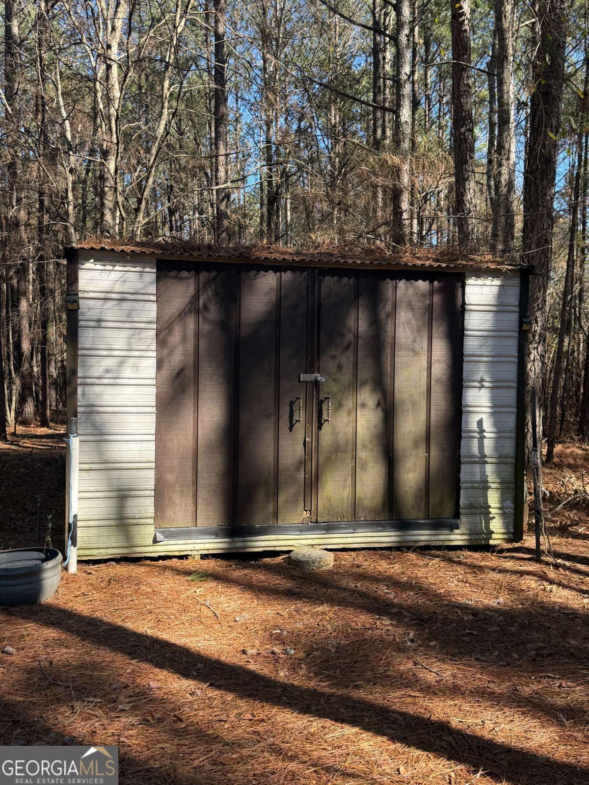 670 Jefferies Road Shady Dale, GA 31085 - Photo 28 of 29 a front view of a house
