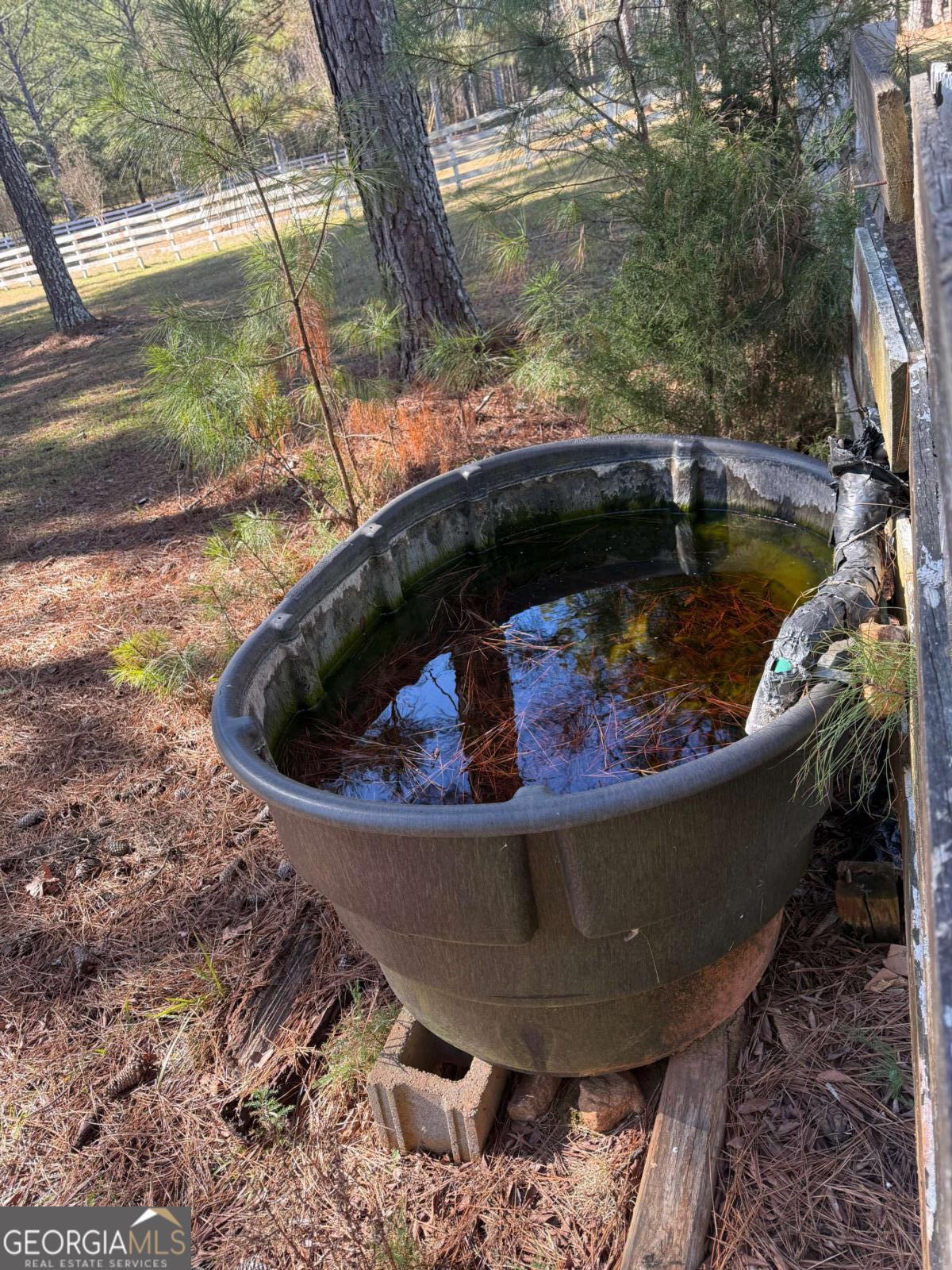 670 Jefferies Road Shady Dale, GA 31085 - Photo 7 of 29 a view of a bathtub in a yard