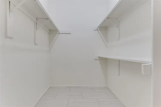 a view of an empty walk in closet