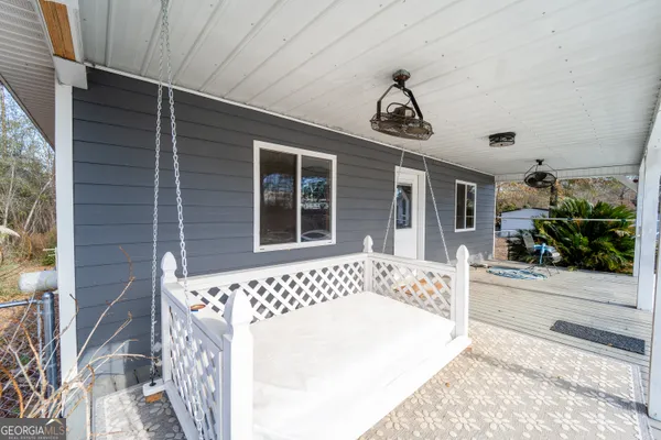 a front view of a house with swimming pool
