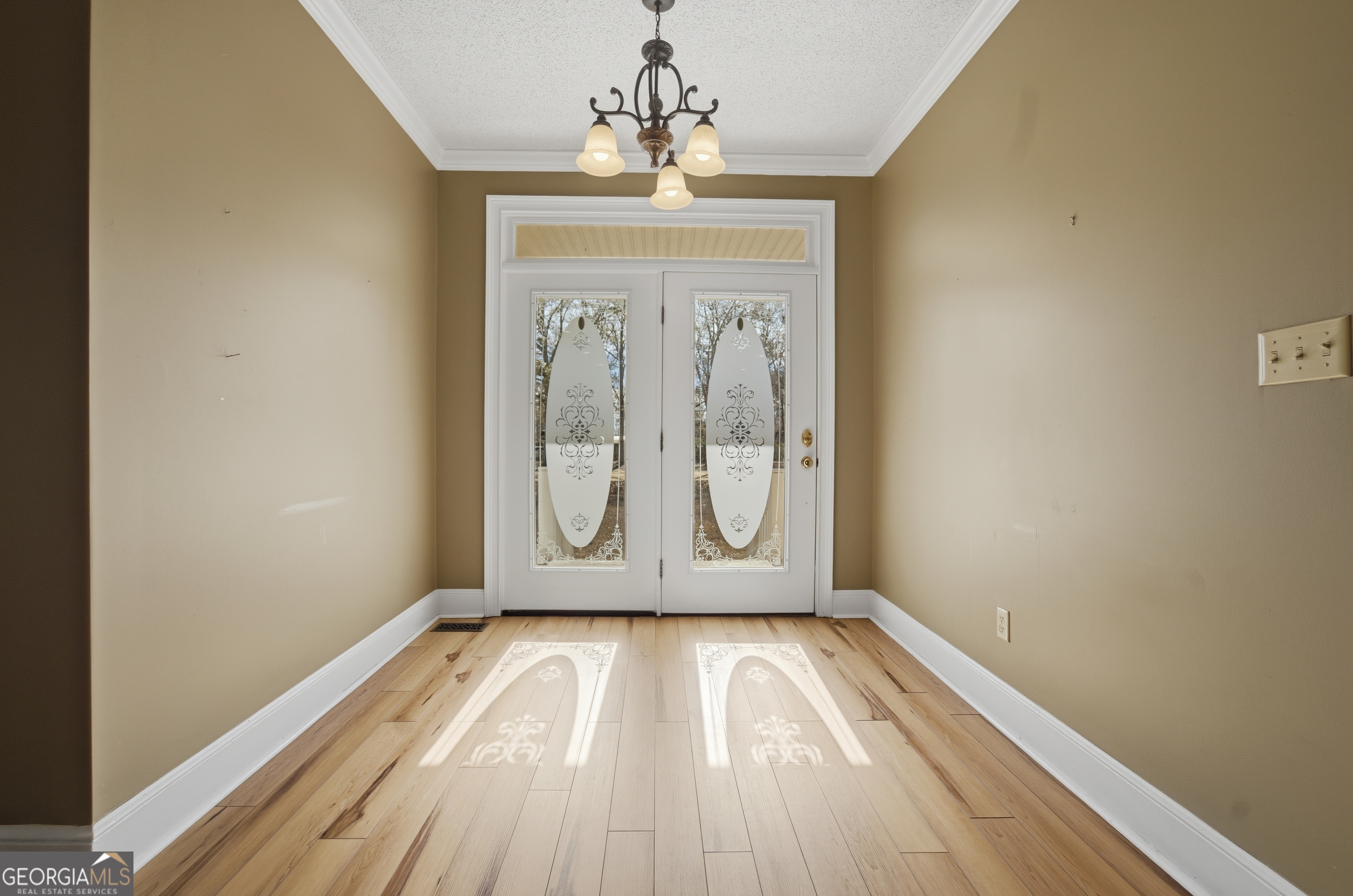 134 Patrick Street Swainsboro, GA 30401 - Photo 16 of 57 a view of a room with wooden floor and window