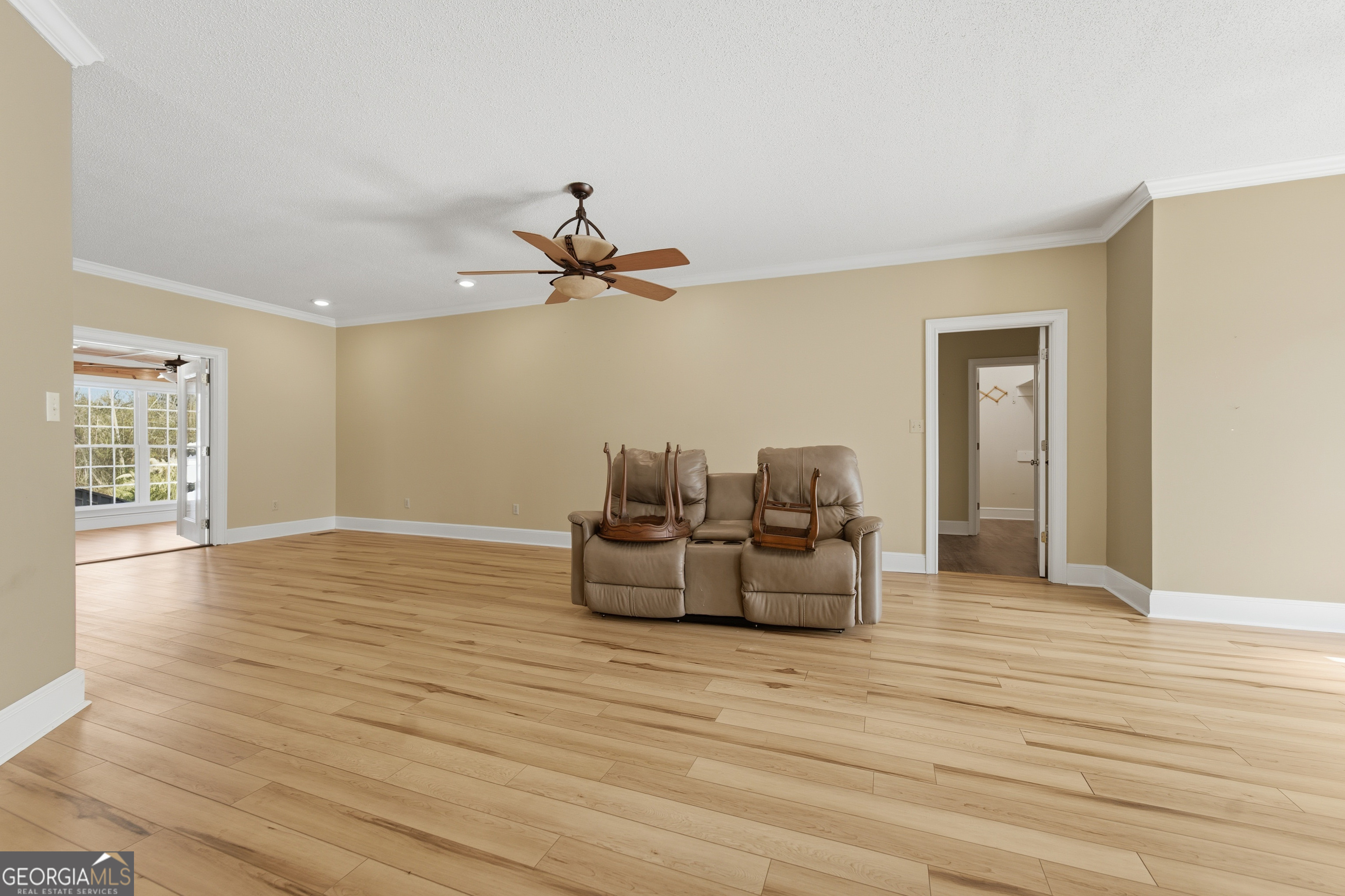 134 Patrick Street Swainsboro, GA 30401 - Photo 20 of 57 a living room with furniture and a wooden floor