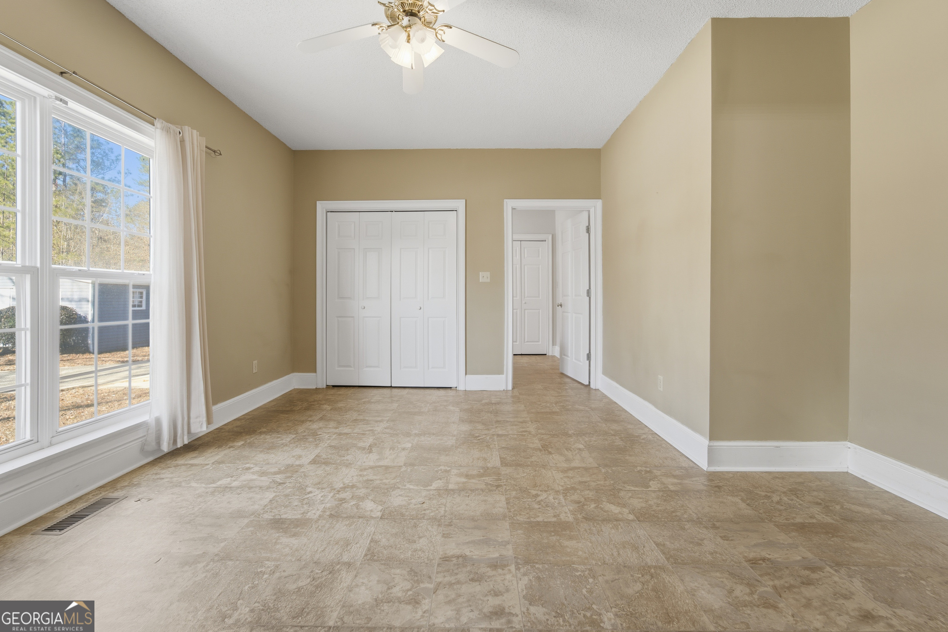 134 Patrick Street Swainsboro, GA 30401 - Photo 21 of 57 a view of an empty room with a window