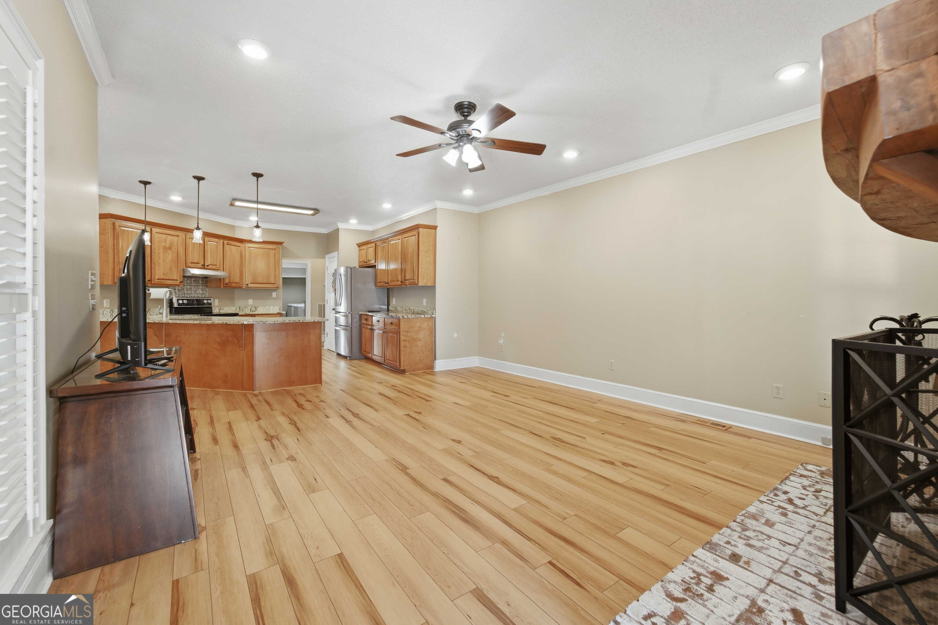 134 Patrick Street Swainsboro, GA 30401 - Photo 56 of 57 a view of a kitchen with a sink and a refrigerator