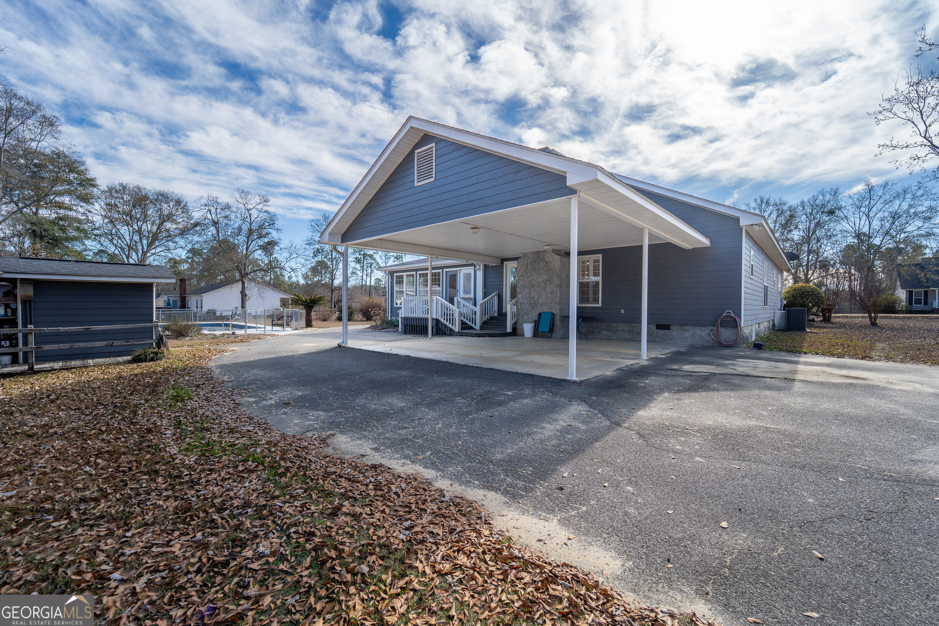 134 Patrick Street Swainsboro, GA 30401 - Photo 8 of 57 a view of a house with a yard