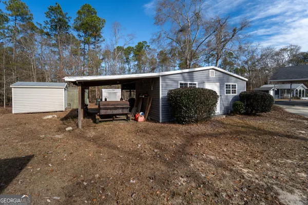 a house with trees in front of it