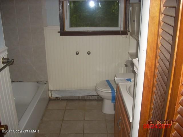 1109 Mattioli Road Bartonsville, PA 18321 - Photo 5 of 9 a bathroom with a sink and a toilet