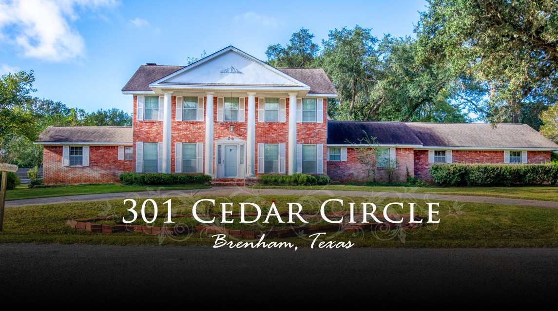 301 Cedar Circle Brenham, TX 77833 - Photo 1 of 20 Neoclassical / greek revival house with a front yard and brick siding