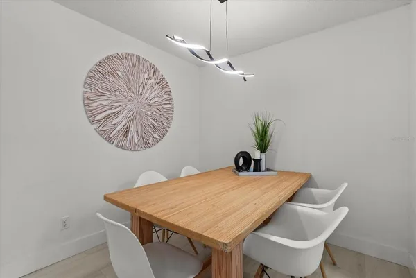 a view of a dining room with furniture