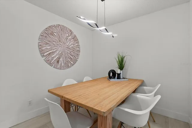 a view of a dining room with furniture