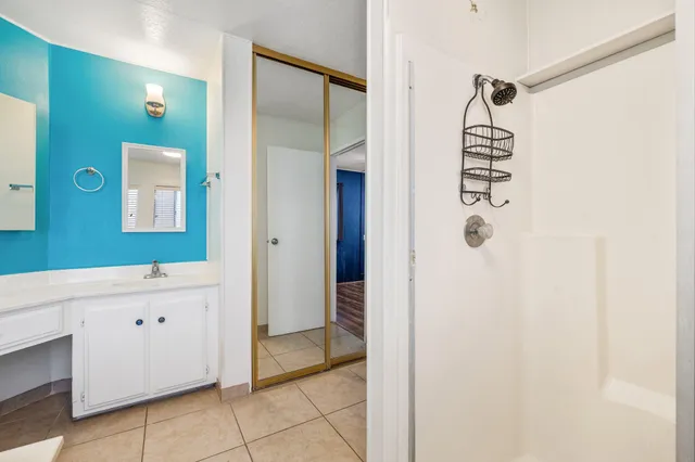 a bathroom with a sink and a vanity