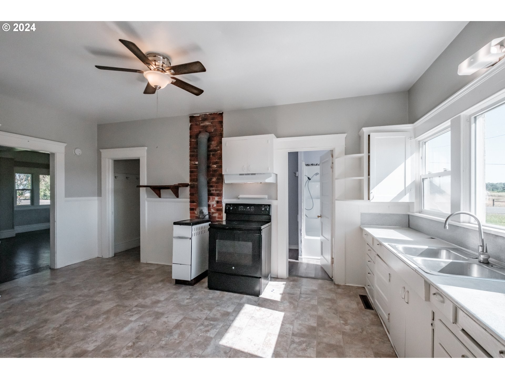 28766 Highway 36 Junction City, OR 97448 - Photo 16 of 36 a open kitchen with a sink stainless steel appliances and cabinets