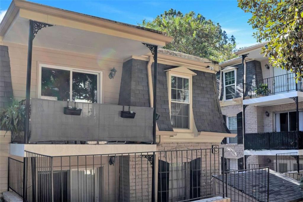 a front view of a house with a porch